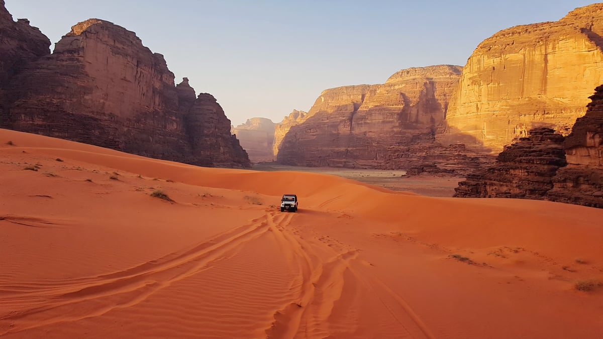 Wadi Rum desert red dunes and sandstone mountains