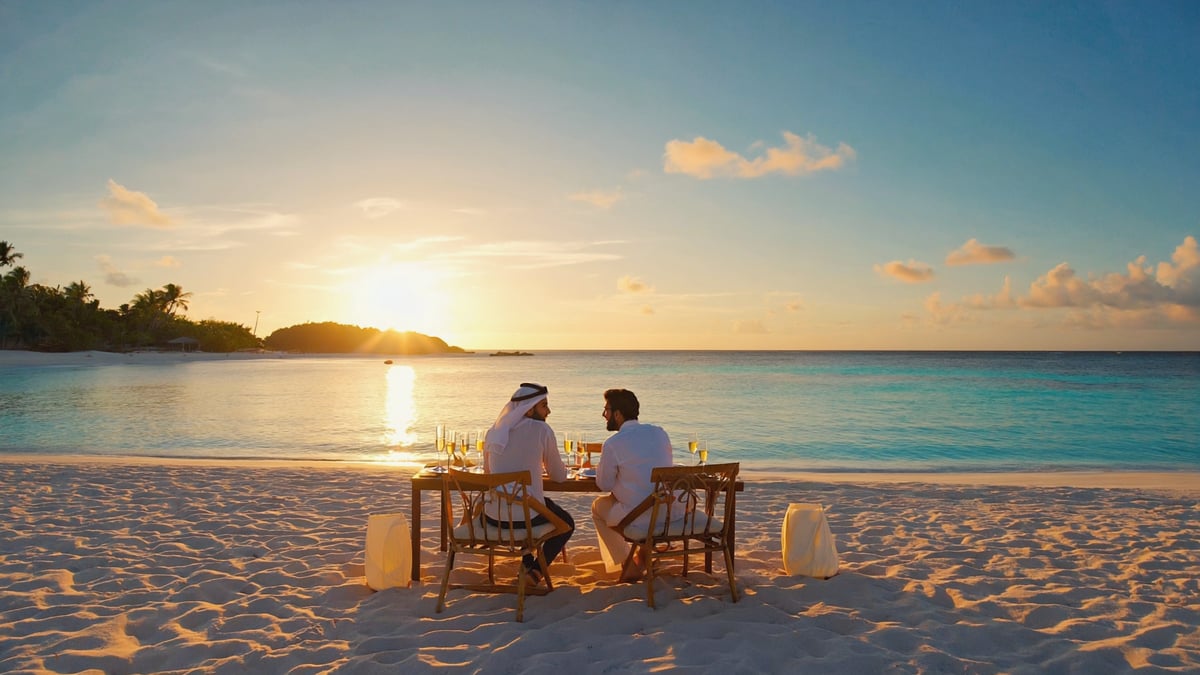 Maldives beach dinner table at sunset